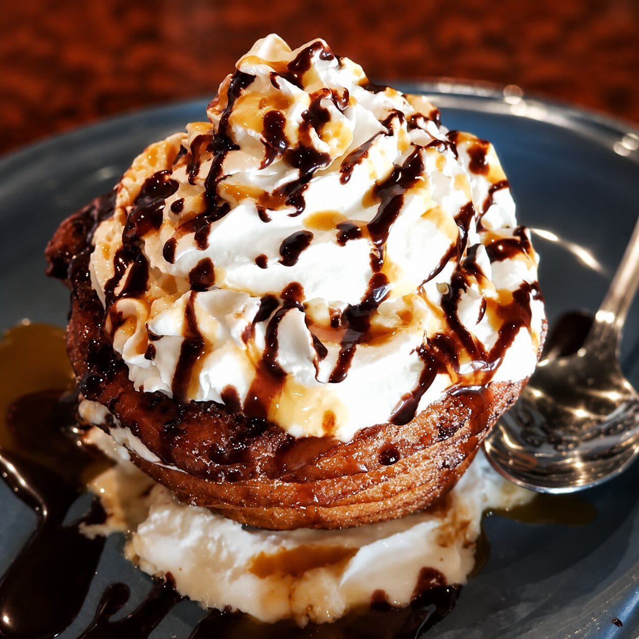 Churro dessert with whipped cream from Ay Caramba